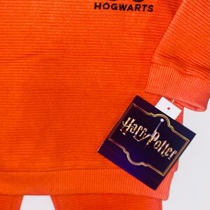 Warner Bros. Bright Orange Hogwarts Sweater